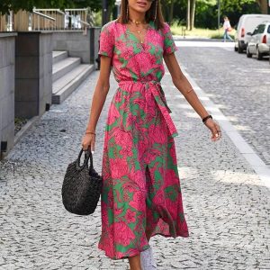 Gebloemde splitjurk met strik in taille